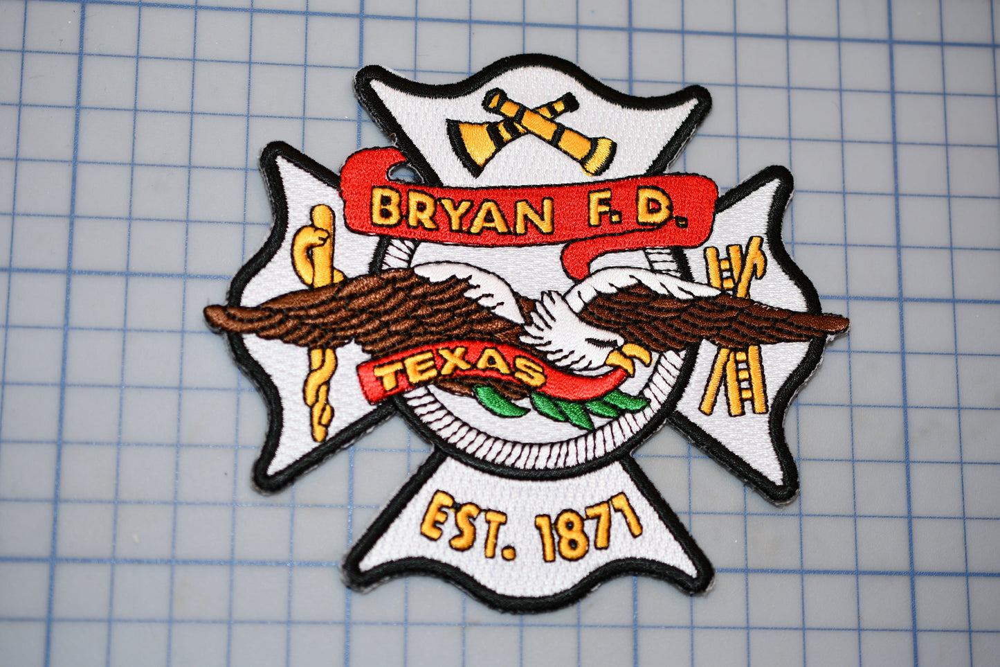 a fire department badge on a cutting board