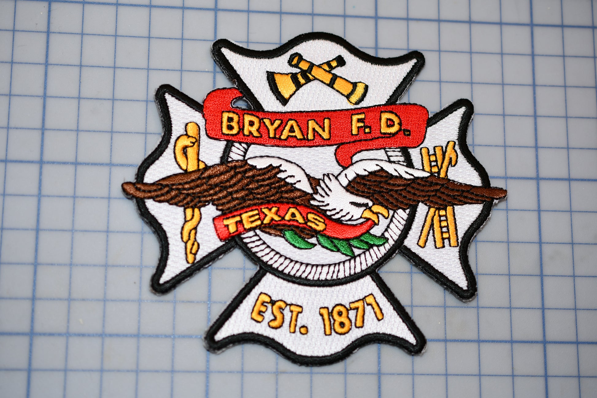 a fire department badge on a cutting board