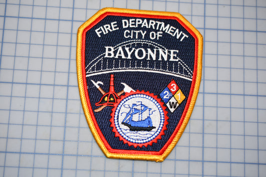 a fire department patch on a piece of paper