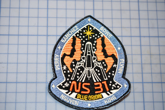 a patch with a space shuttle on it