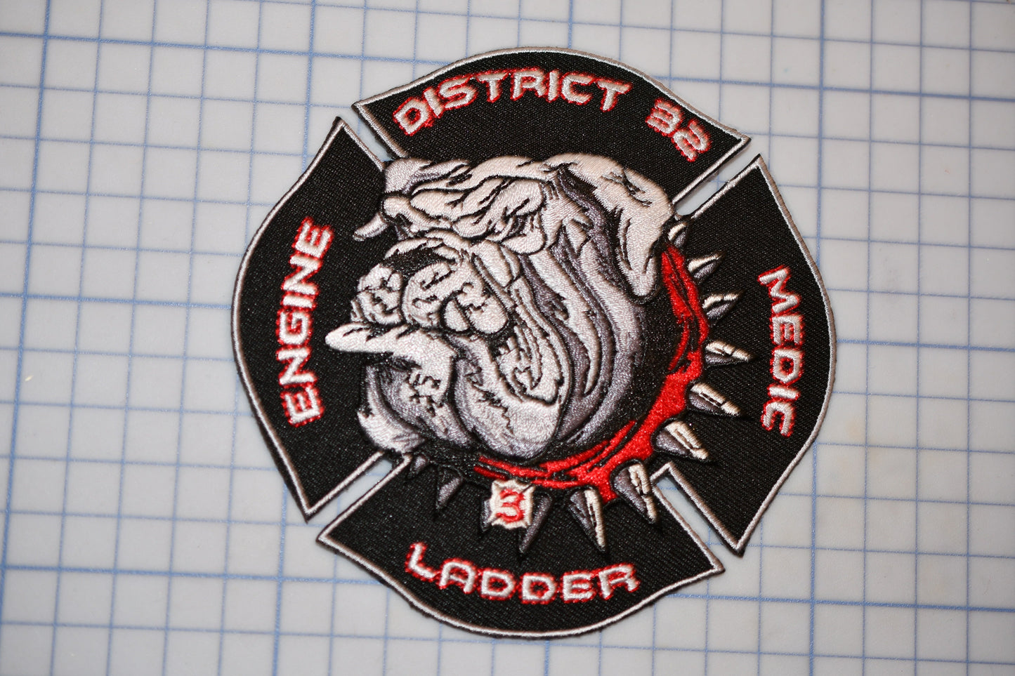 a fire department patch with a bulldog emblem, surrounded by text that identifies the department's specialty.