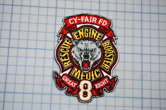 a patch with a picture of a wolf on it