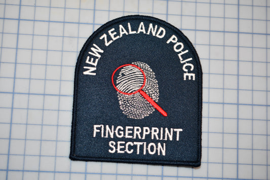 a New Zealand Police fingerprint section patch.