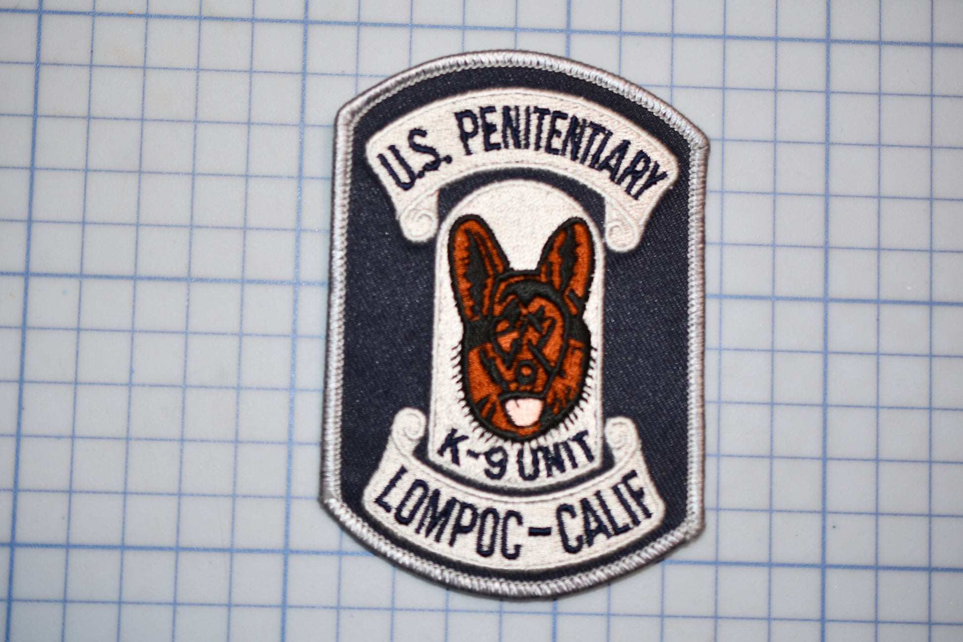 a U.S. Penitory K-9 unit patch from Lompoc-California.