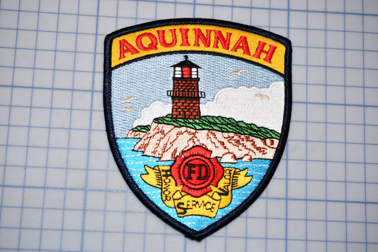 a picture of a patch with a lighthouse on it