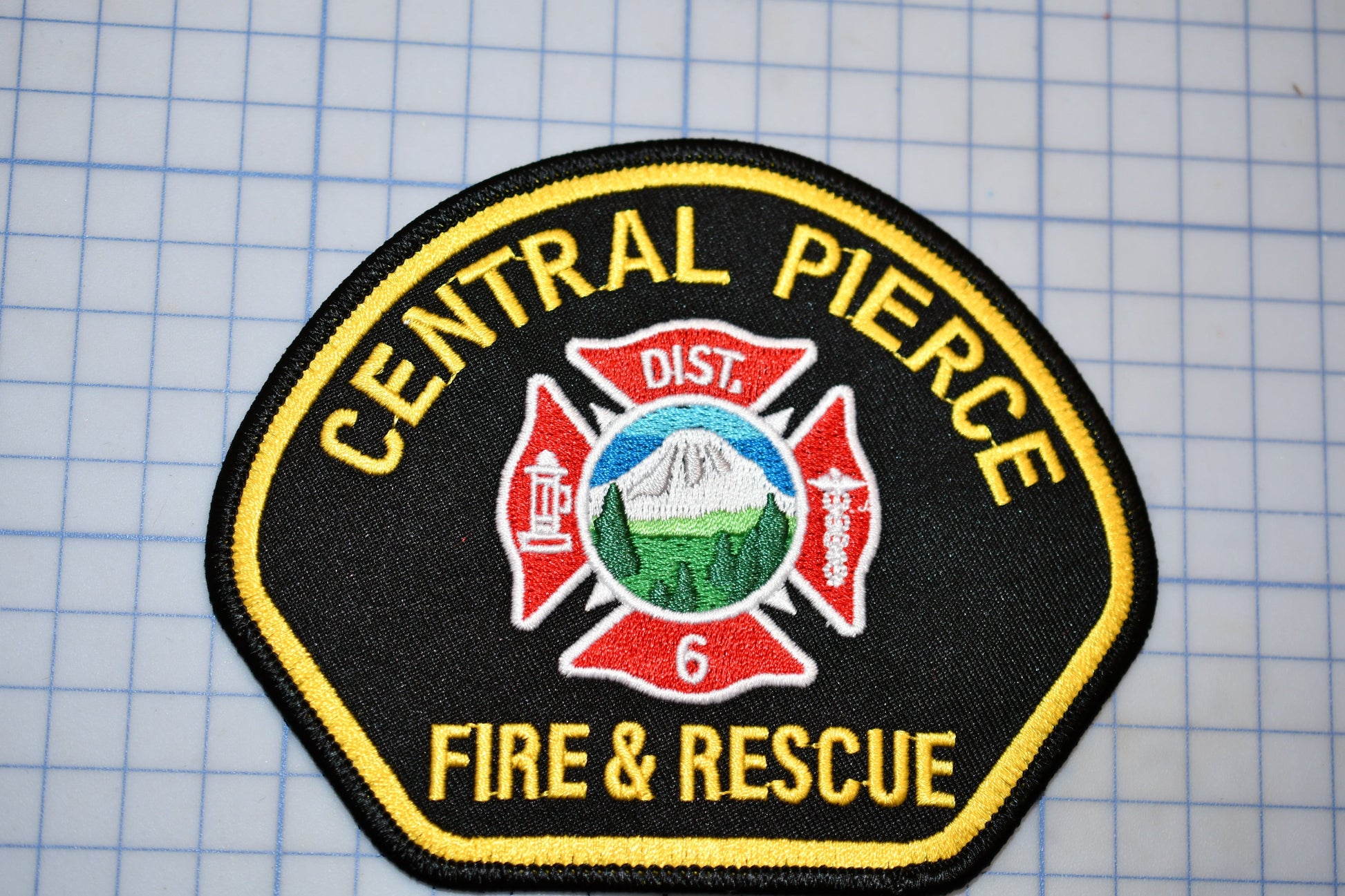 A patch with the text "CENTRAL PIERCE FIRE & RESCUE" and a fire department emblem, indicating it is a badge or patch from the Central Pierce Fire & Rescue department.