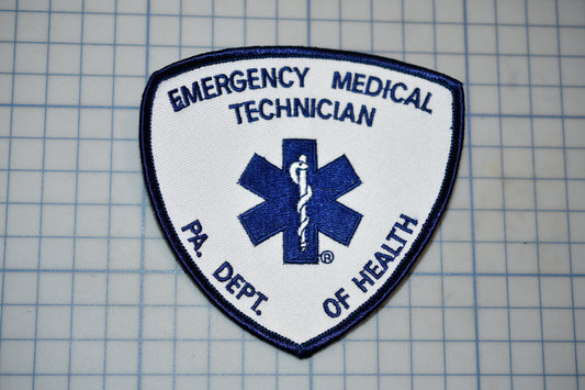 a medical emergency technician patch with a blue and white design.