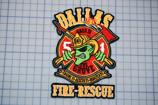 a patch with a fireman holding a baseball bat