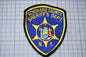 a blue and yellow patch with the words schroaie county sheriff&#39;s
