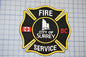 a fire department patch on a cutting board