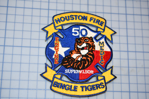 a badge with a tiger on it on a piece of paper