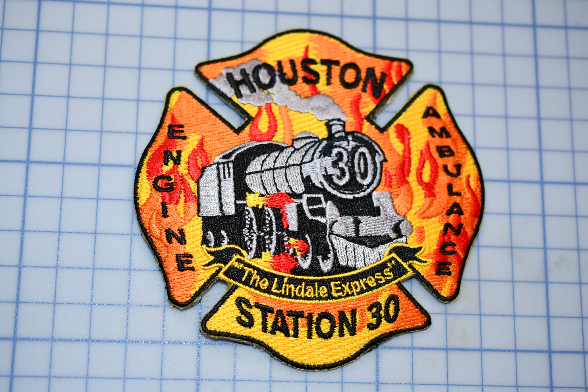 a patch with a fire engine on it