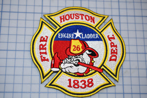 a houston fire department patch on a cutting board
