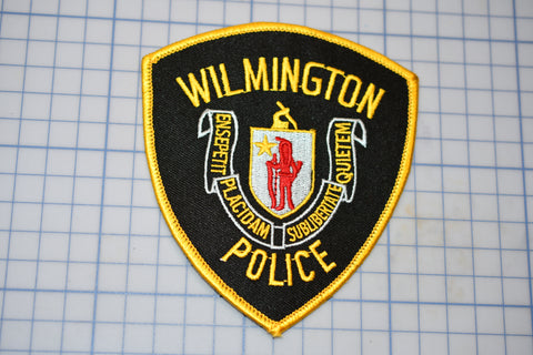 a police badge is shown on a piece of paper