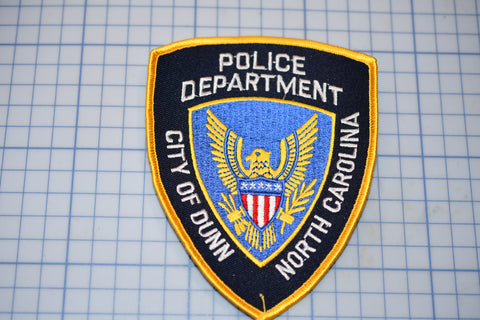 a police department patch on a piece of paper
