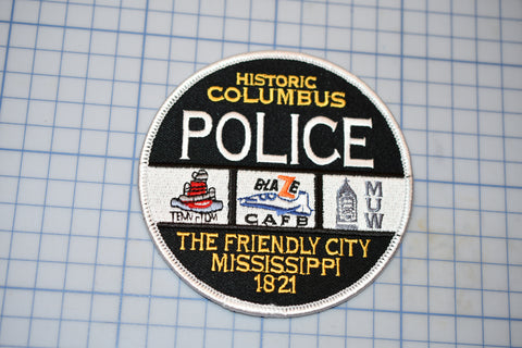 a patch with the words police on it