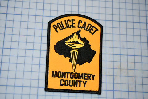 a patch that says police cadet montgomery county