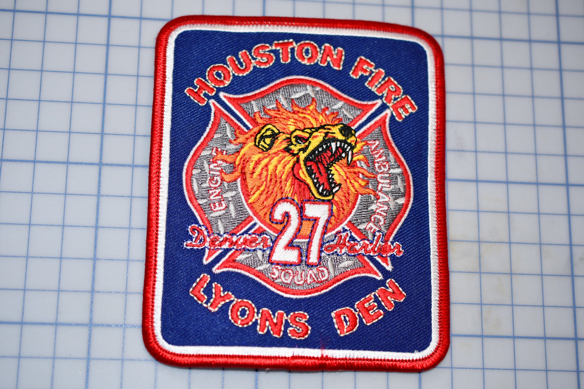 a patch with a picture of a fire department on it