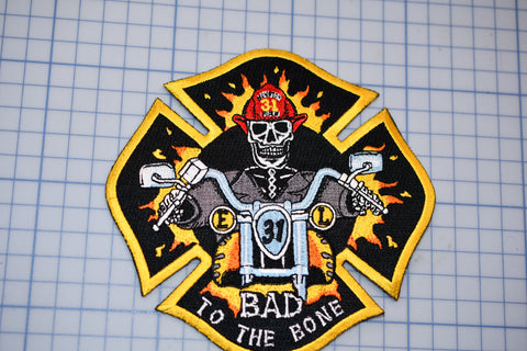 a patch with a skull on it that says, bad to the bone