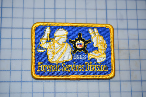 a patch with a picture of two people on it