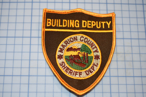 a patch that says building depot on it