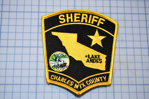 a patch of a sheriff badge on a cutting board