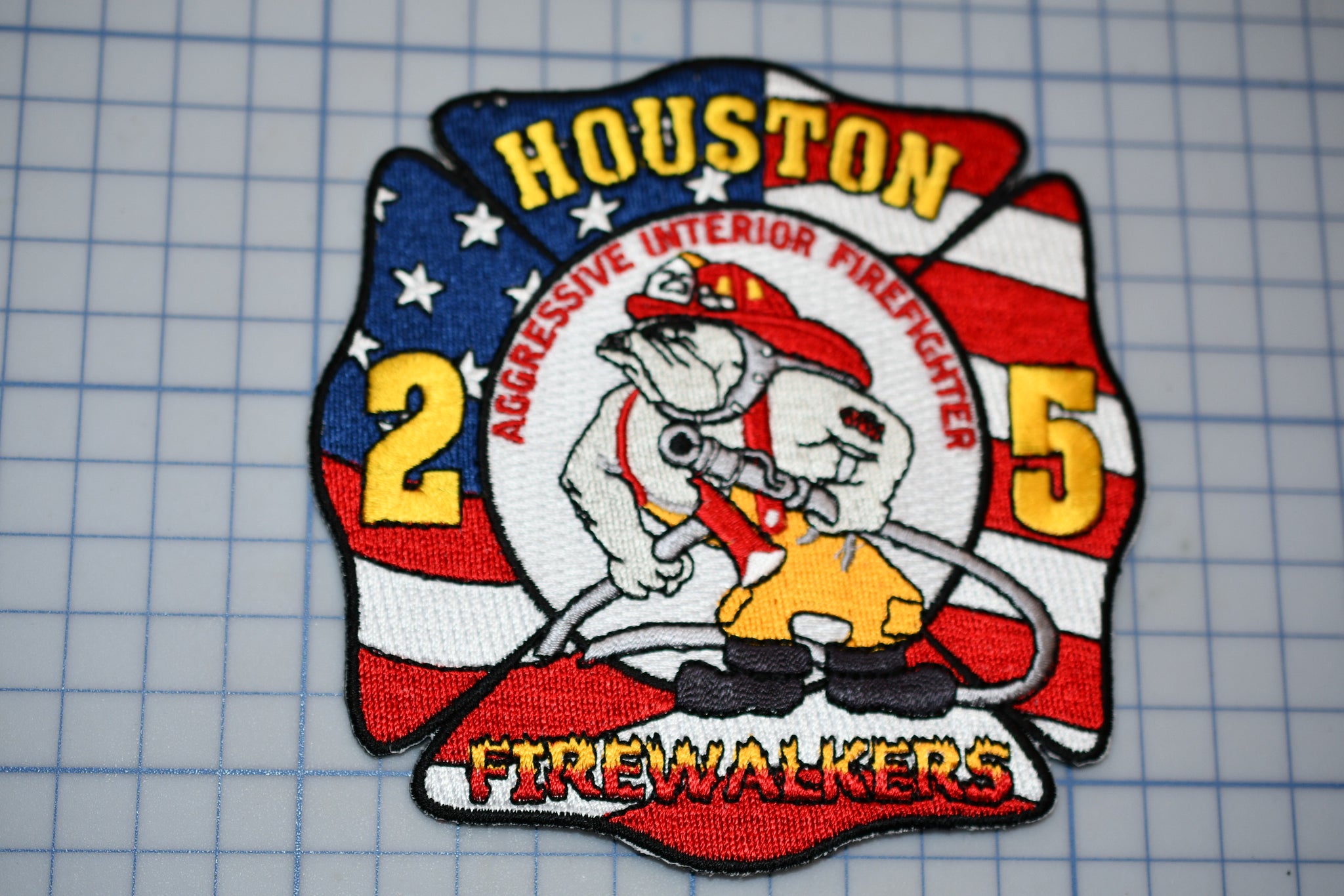 a patch with a firefighter mouse on it
