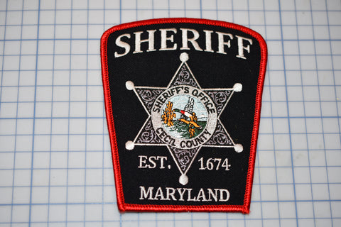 a sheriff badge on a piece of paper