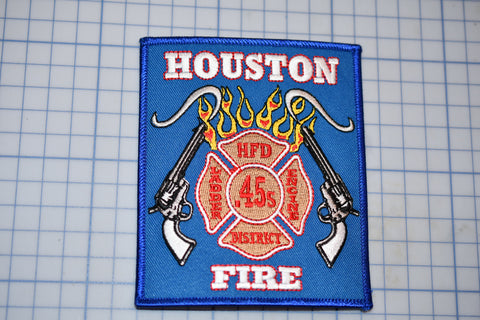 a houston fire department patch on a cutting board