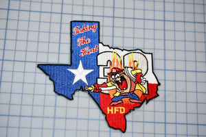 a picture of a texas state with a fireman on it