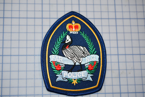 a police patch with a bird on it