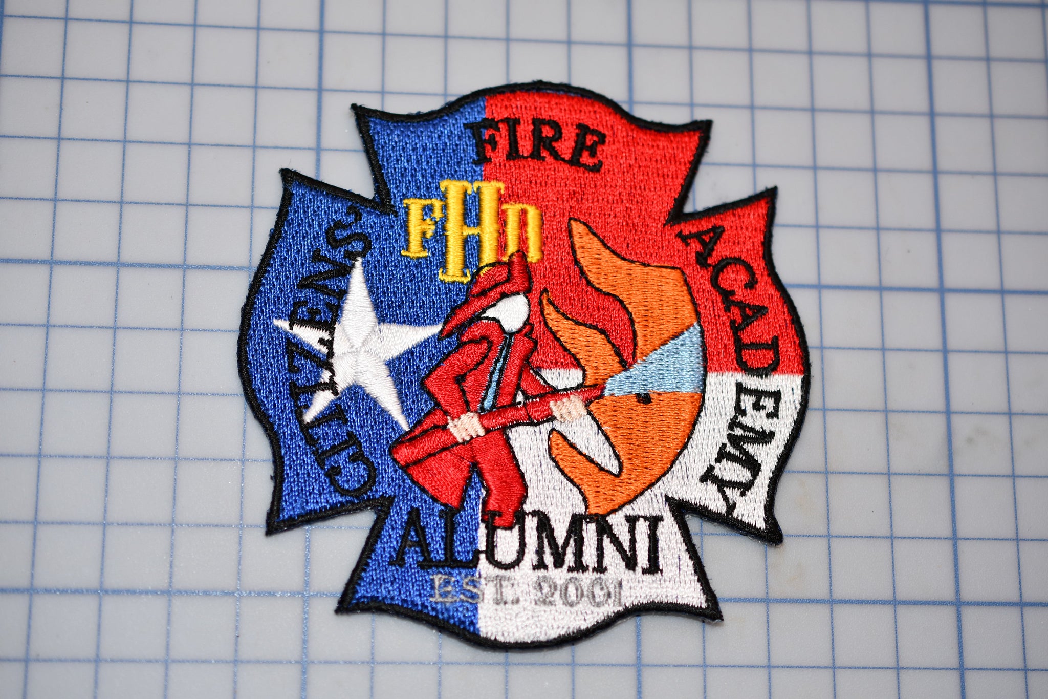 a patch with a fire department emblem on it